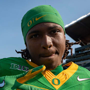 Oregon Ducks Dakorien Moore Dante Moore Dan Lanning injury iowa hakeyes kinnick stadium big ten college football playoff