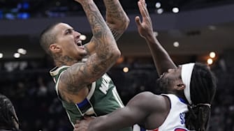 Dec 3, 2025; Milwaukee, Wisconsin, USA; Milwaukee Bucks forward Kyle Kuzma (18) drives to the basket against Detroit Pistons forward Isaiah Stewart (28) in the first half at Fiserv Forum. Mandatory Credit: Michael McLoone-Imagn Images