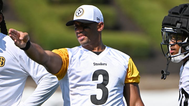 Jul 28, 2024; Latrobe, PA, USA; Pittsburgh Steelers quarterback Russell Wilson (3) talks to wide receiver Calvin Austin III (19) during training camp at Saint Vincent College. Mandatory Credit: Barry Reeger-Imagn Images