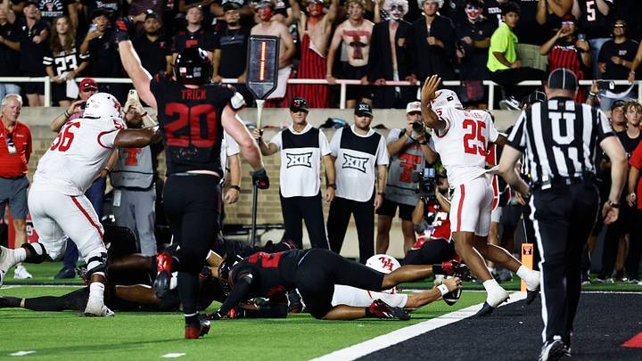 Sep 18, 2026; Lubbock, Texas, USA;  Houston Cougars quarterback Conner Weigman (1) reaches for the goal line against the Texas Tech Red Raiders on a two-point attempt near the end of the fourth quarter at Galaxy Stadium.  Mandatory Credit: Michael C. Johnson-Imagn Images