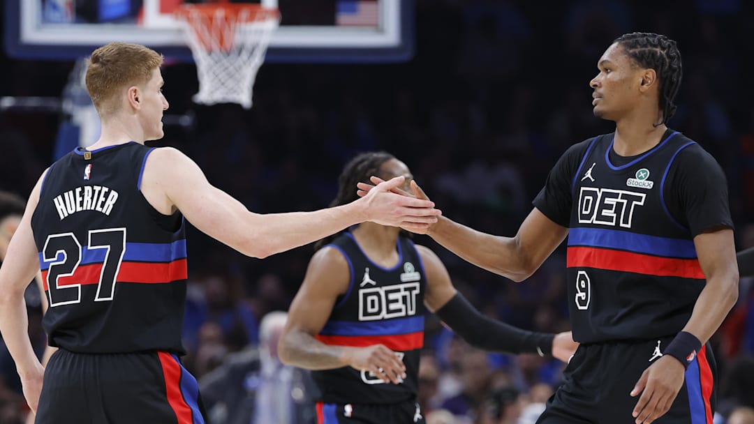 Mar 30, 2026; Oklahoma City, Oklahoma, USA; Detroit Pistons guard Kevin Huerter (27) and guard Ausar Thompson (9) celebrate a play against the Oklahoma City Thunder during the second half at Paycom Center. Mandatory Credit: Alonzo Adams-Imagn Images