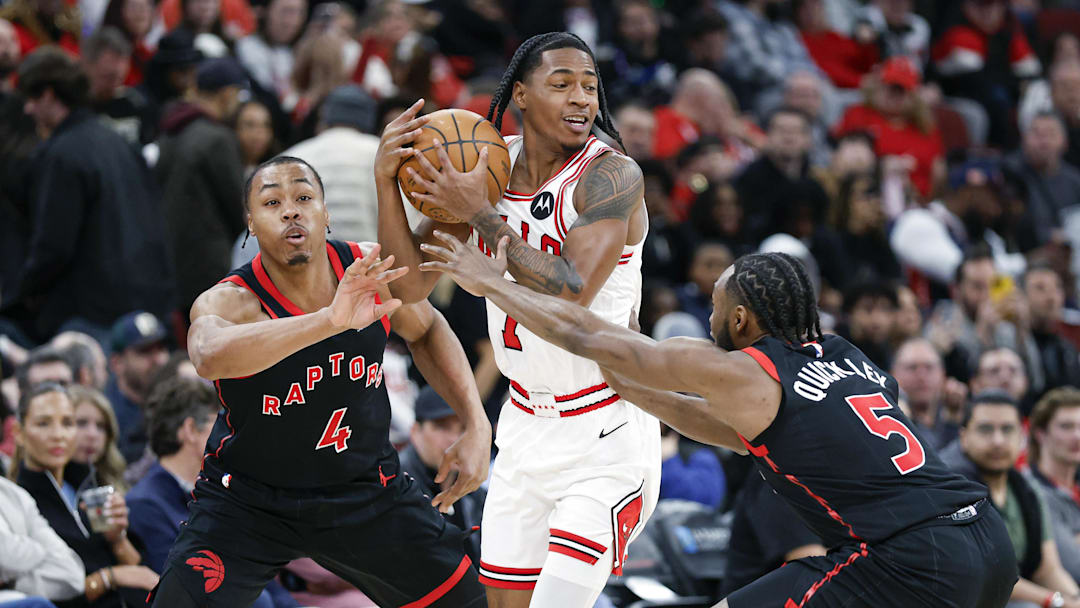 Feb 19, 2026; Chicago, Illinois, USA; Toronto Raptors forward Scottie Barnes (4) and guard Immanuel Quickley (5) defend against Chicago Bulls guard Rob Dillingham (7) during the first half at United Center. Mandatory Credit: Kamil Krzaczynski-Imagn Images Feb 19, 2026; Chicago, Illinois, USA; Toronto Raptors forward Scottie Barnes (4) and guard Immanuel Quickley (5) defend against Chicago Bulls guard Rob Dillingham (7) during the first half at United Center. Mandatory Credit: Kamil Krzaczynski-Imagn Images