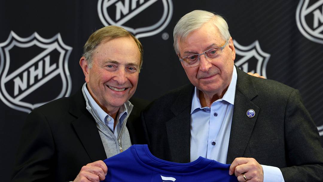 Jan 12, 2026; Buffalo, New York, USA;  NHL Commissioner Gary Bettman and Buffalo Sabres owner Terry Pegula pose for a photo during a press conference announcing the 2026 NHL Draft taking place in Buffalo at KeyBank Center. Mandatory Credit: Timothy T. Ludwig-Imagn Images