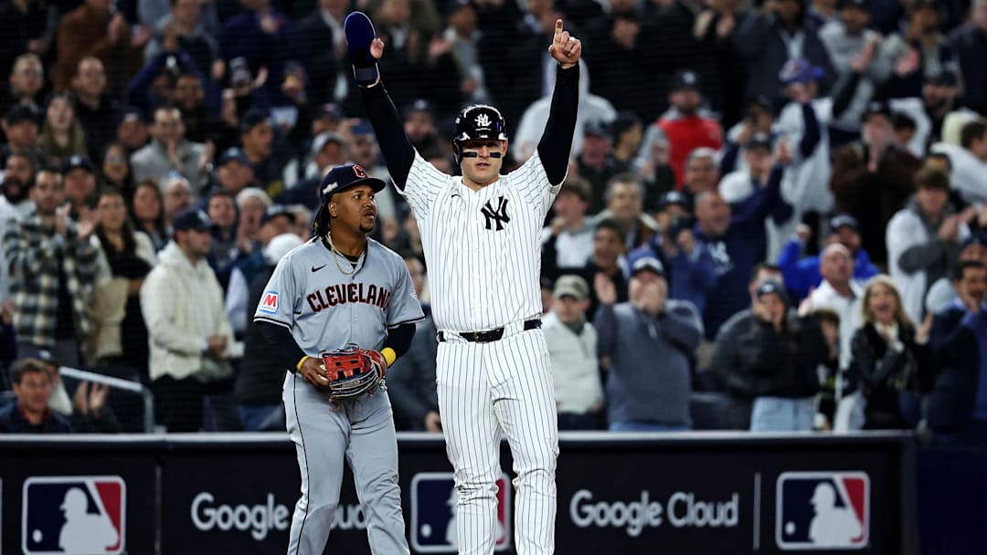 Oct 15, 2024; Bronx, New York, USA; New York Yankees first base Anthony Rizzo (48) celebrates after reaching third base during the second inning against the Cleveland Guardians in game two of the ALCS for the 2024 MLB Playoffs at Yankee Stadium. Mandatory Credit: Wendell Cruz-Imagn Images