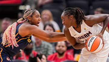 May 9, 2024; Indianapolis, IN, USA; Indiana Fever forward Aliyah Boston (7) guards Atlanta Dream guard Jordin Canada (3) on Thursday, May 9, 2024, during the preseason game against the Atlanta Dream at Gainbridge Fieldhouse in Indianapolis. The Indiana Fever defeated the Atlanta Dream, 83-80. Mandatory Credit: Grace Hollars-Imagn Images