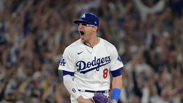 Oct 11, 2024; Los Angeles, California, USA; Los Angeles Dodgers third baseman Enrique Hernandez (8) celebrates after defeating the San Diego Padres during game five of the NLDS for the 2024 MLB Playoffs at Dodger Stadium. Mandatory Credit: Jayne Kamin-Oncea-Imagn Images