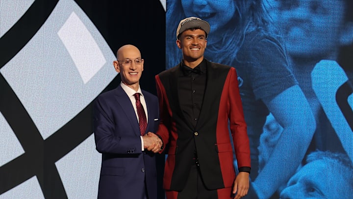 Jun 26, 2024; Brooklyn, NY, USA; Tristan da Silva poses for photos with NBA commissioner Adam Silver after being selected in the first round by the Orlando Magic in the 2024 NBA Draft at Barclays Center. Mandatory Credit: Brad Penner-Imagn Images