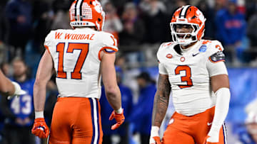 Dec 7, 2024; Charlotte, NC, USA; Clemson Tigers defensive end T.J. Parker (3) celebrates with linebacker Wade Woodaz (17) after a play during the second quarter against the Southern Methodist Mustangs in the 2024 ACC Championship game at Bank of America Stadium. Mandatory Credit: Bob Donnan-Imagn Images