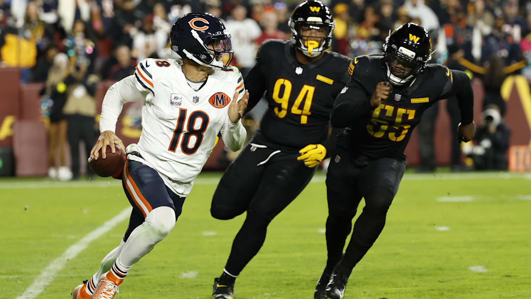 Chicago Bears QB Caleb Williams scrambles from Washington Commanders defenders. Mandatory Credit: Geoff Burke-Imagn Images Chicago Bears QB Caleb Williams scrambles from Washington Commanders defenders. Mandatory Credit: Geoff Burke-Imagn Images