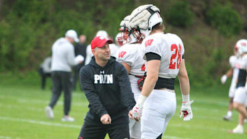 Wisconsin defensive coordinator Mike Tressel makes a point to linebacker Christian Alliegro during the team's final spring practice, which was held on the field north of Camp Randall Stadium on Thursday May 2, 2024 in Madison, Wisconsin.