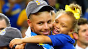 June 12, 2017; Oakland, CA, USA; Golden State Warriors guard Stephen Curry (30) celebrates with his daughter Riley Curry after beating the Cleveland Cavaliers in game five of the 2017 NBA Finals at Oracle Arena.