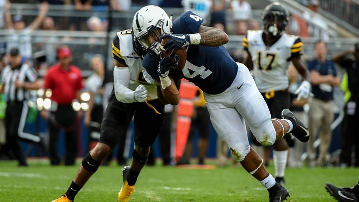 Ricky Slade (4) dives for the end zone during the Penn State opener against Appalachian State at Beaver Stadium on September 1, 2018.

Ydr Cc9118 Psu