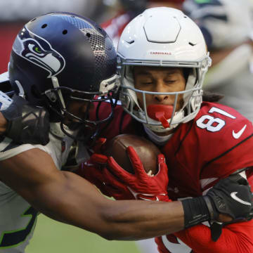 Nov 6, 2022; Seattle Seahawks defensive back  Mike Jackson (30)  tackles Arizona Cards receiver Robbie Anderson (81) in the first half in Glendale, Arizona, USA;  at State Farm Stadium. Mandatory Credit: David Cruz-USA TODAY Sports
