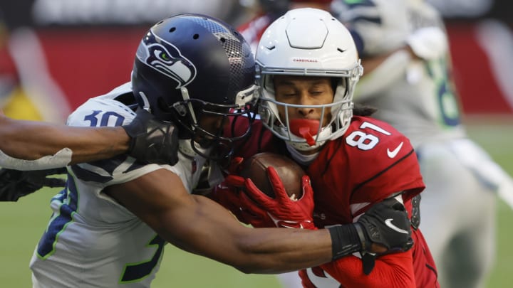 Nov 6, 2022; Seattle Seahawks defensive back  Mike Jackson (30)  tackles Arizona Cards receiver Robbie Anderson (81) in the first half in Glendale, Arizona, USA;  at State Farm Stadium. Mandatory Credit: David Cruz-USA TODAY Sports