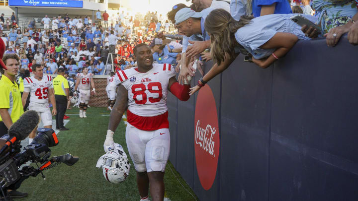 Sep 17, 2022; Atlanta, Georgia, USA; Mississippi Rebels defensive tackle JJ Pegues (89) celebrates with fans after a victory against the Georgia Tech Yellow Jackets at Bobby Dodd Stadium. Mandatory Credit: Brett Davis-USA TODAY Sports
