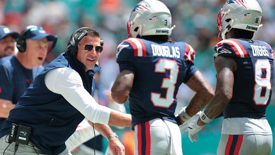 Mike Vrabel led the Patriots to a 42–12 win over the Panthers.