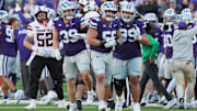 Kansas State Wildcats defensive tackle Damian Ilalio, defensive end Travis Bates