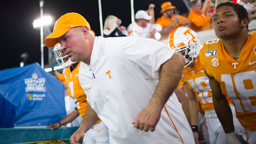 Tennessee football coach Jeremy Pruitt runs onto the field during the Gator Bowl game between Tennessee and Indiana at the TIAA Bank Field in Jacksonville, Fla., Jan. 2, 2020. Tennessee football coach Jeremy Pruitt runs onto the field during the Gator Bowl game between Tennessee and Indiana at the TIAA Bank Field in Jacksonville, Fla., Jan. 2, 2020.