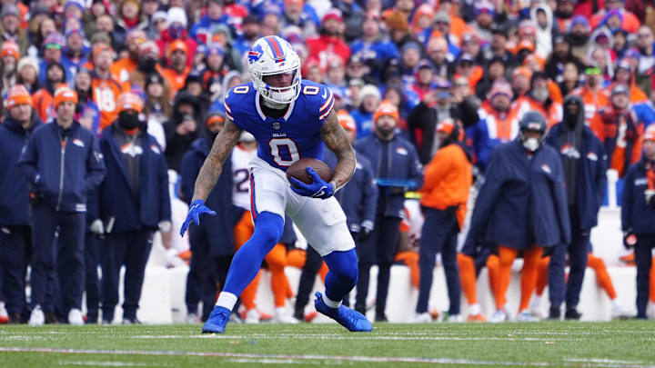 Jan 12, 2025; Orchard Park, New York, USA; Buffalo Bills wide receiver Keon Coleman (0) runs for a gain during the first quarter against the Denver Broncos in an AFC wild card game