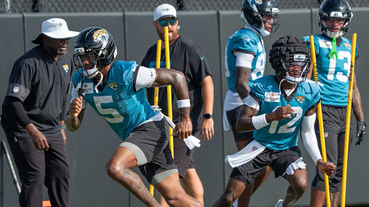 Jacksonville Jaguars wide receivers Dyami Brown and Travis Hunter run drills during the team's NFL training camp session