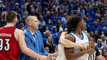 Kentucky Wildcats head coach Mark Pope leads his team out of the argument during their game against the Louisville Cardinals on Saturday, Dec. 14, 2024 at Rupp Arena in Lexington, Ky.