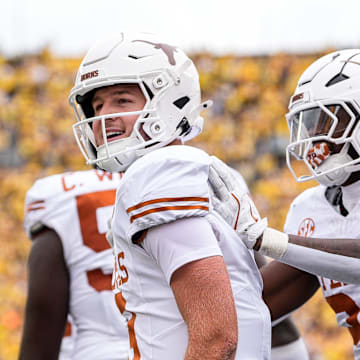 Texas quarterback Quinn Ewers (3) celebrates a touchdown against Michigan during the first half at Michigan Stadium in Ann Arbor on Saturday, September 7, 2024.