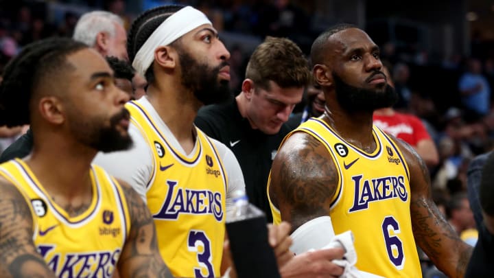 Apr 19, 2023; Memphis, Tennessee, USA; Los Angeles Lakers guard D'Angelo Russell (1), forward Anthony Davis (3) and forward LeBron James (6) sit on the bench during a timeout during game two of the 2023 NBA playoffs against the Memphis Grizzlies at FedExForum. Mandatory Credit: Petre Thomas-USA TODAY Sports