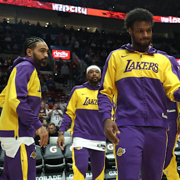 Apr 13, 2025; Portland, Oregon, USA;  Los Angeles Lakers guard Bronny James (9) enters the line up before playing in a game against the Portland Trail Blazers at Moda Center. Mandatory Credit: Jaime Valdez-Imagn Images