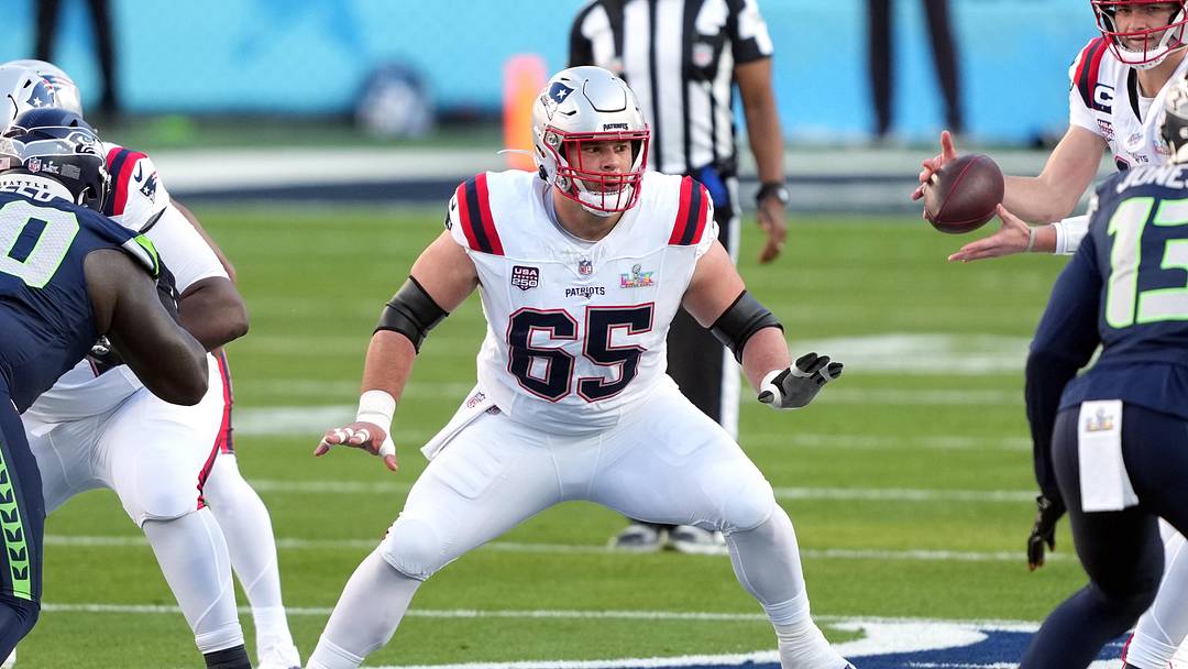 Feb 8, 2026; Santa Clara, CA, USA; New England Patriots center Garrett Bradbury (65) blocks against the Seattle Seahawks during the first quarter in Super Bowl LX at Levi's Stadium. Mandatory Credit: Darren Yamashita-Imagn Images