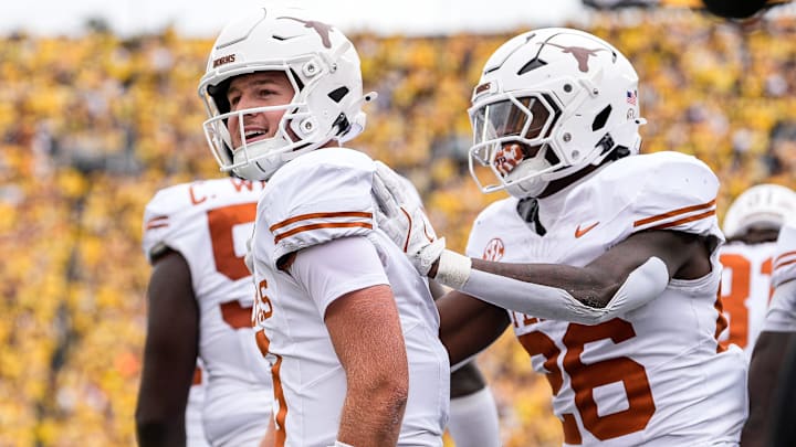 Texas quarterback Quinn Ewers (3) celebrates a touchdown against Michigan during the first half at Michigan Stadium in Ann Arbor on Saturday, September 7, 2024.