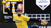 Oregon’s Elise Sokolsky pitches in relief during the third inning against Michigan.