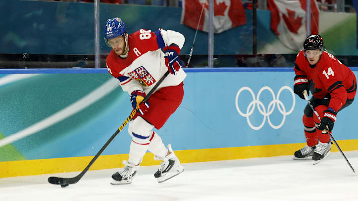 Feb 18, 2026; Milan, Italy; David Pastrnak of Czechia controls the puck against Canada in a men's ice hockey quarterfinal during the Milano Cortina 2026 Olympic Winter Games at Milano Santagiulia Ice Hockey Arena. Mandatory Credit: Geoff Burke-Imagn Images