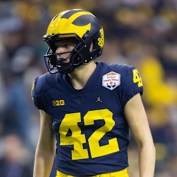 Jesse Madden played QB and DB for the Michigan Wolverines.
