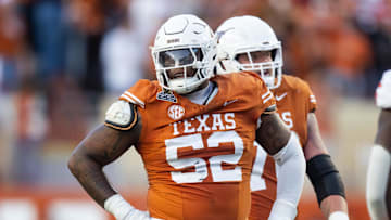 Dec 21, 2024; Austin, Texas, USA; Texas Longhorns offensive lineman DJ Campbell (52) against the Clemson Tigers during the CFP National playoff first round at Darrell K Royal-Texas Memorial Stadium. Mandatory Credit: Mark J. Rebilas-Imagn Images