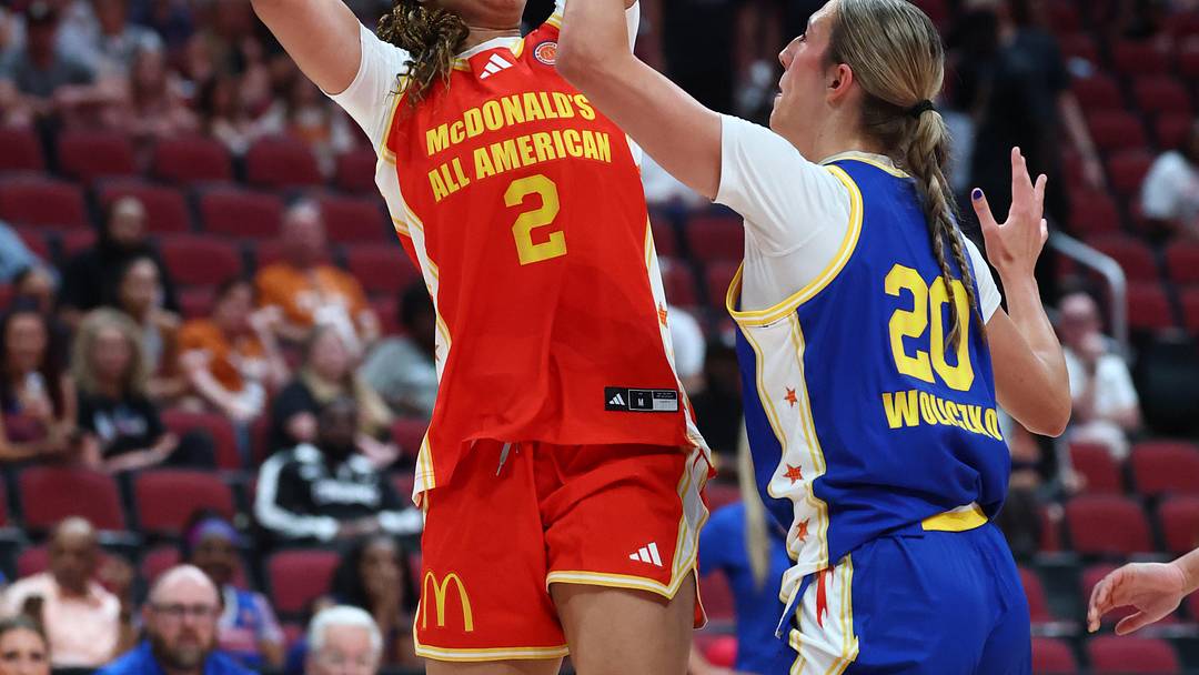 Mar 31, 2026; Glendale, AZ, USA; Saniyah Hall (2) shoots the ball against McKenna Woliczko (20) during the McDonalds All American Girls Game at Desert Diamond Arena. Mandatory Credit: Mark J. Rebilas-Imagn Images