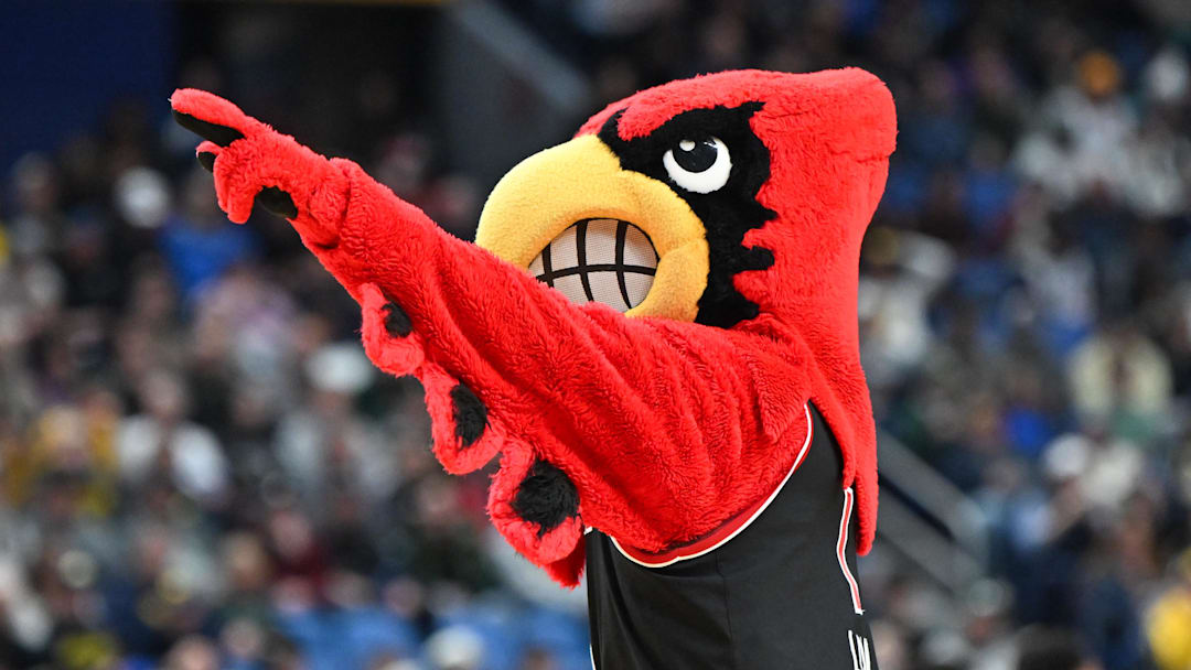 Mar 21, 2026; Buffalo, NY, USA; Louisville Cardinals mascot Louie looks on during the first half against the Michigan State Spartans during a second round game of the men's 2026 NCAA Tournament at Keybank Center. Mandatory Credit: Mark Konezny-Imagn Images