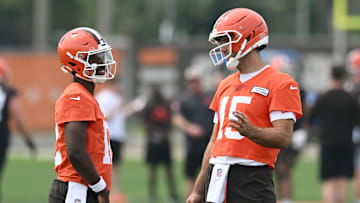 Jun 12, 2025; Berea, OH, USA; Cleveland Browns quarterback Joe Flacco (15) talks to quarterback Shedeur Sanders (12) during mini camp at CrossCountry Mortgage Campus. Mandatory Credit: Ken Blaze-Imagn Images