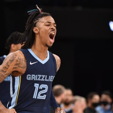 Nov 18, 2021; Memphis, Tennessee, USA; Memphis Grizzlies guard Ja Morant (12) reacts during the second half against the LA Clippers at FedExForum. 