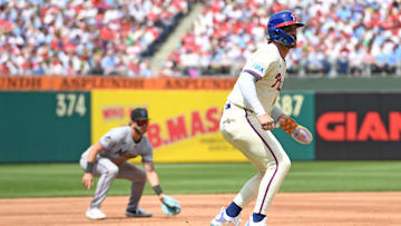 Apr 20, 2025; Philadelphia, Pennsylvania, USA; Philadelphia Phillies first base Bryce Harper (3) takes a lead off third base during the first inning against the Miami Marlins at Citizens Bank Park.