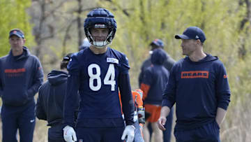 May 10, 2025; Lake Forest, IL, USA; Chicago Bears head coach Ben Johnson talks with tight end (84)  Colston Loveland during Rookie Minicamp at Halas Hall. Mandatory Credit: David Banks-Imagn Images