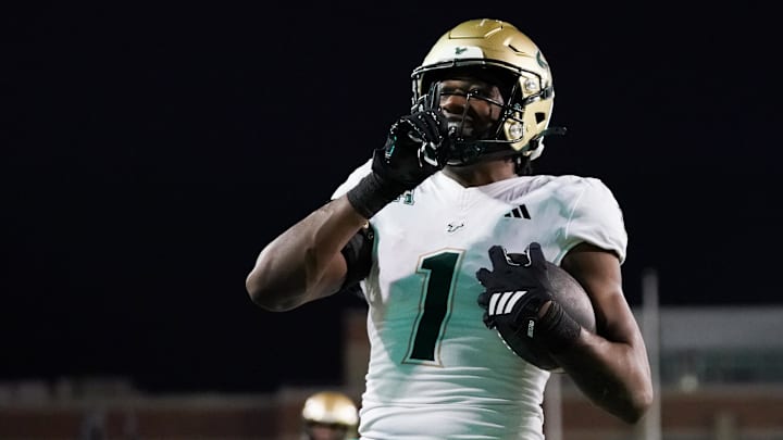 Oct 10, 2025; Denton, Texas, USA; South Florida Bulls tight end Jonathan Echols (1) reacts towards the stands after scoring a touchdown against the North Texas Mean Green during the first half of a game at DATCU Stadium. Mandatory Credit: Raymond Carlin III-Imagn Images
