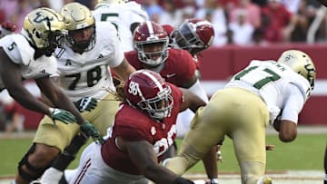 Sep 7, 2024; Tuscaloosa, Alabama, USA;  Alabama Crimson Tide defensive lineman Tim Keenan III (96) tackles South Florida Bulls quarterback Byrum Brown (17) during the first half at Bryant-Denny Stadium. Mandatory Credit: Gary Cosby Jr.-Imagn Images