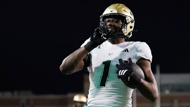 South Florida scored a whopping 63 points to silence the rowdy North Texas home crowd on Friday night.