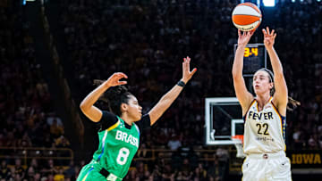 Indiana Fever Caitlin Clark (22) attempts a 3-pointer against Brazilian National Team guard Tainá Mayor da Paixão (8) on Sunday, May 4, 2025, during a preseason game between the Indiana Fever and the Brazil national team at Carver-Hawkeye Arena in Iowa City.