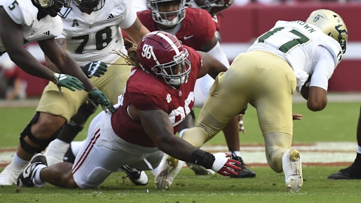 Sep 7, 2024; Tuscaloosa, Alabama, USA;  Alabama Crimson Tide defensive lineman Tim Keenan III (96) tackles South Florida Bulls quarterback Byrum Brown (17) during the first half at Bryant-Denny Stadium. Mandatory Credit: Gary Cosby Jr.-Imagn Images