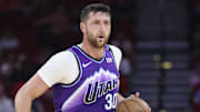 Oct 8, 2025; Houston, Texas, USA; Utah Jazz center Jusuf Nurkic (30) controls the ball as Houston Rockets center Alperen Sengun (28) defends during the first quarter at Toyota Center. Mandatory Credit: Troy Taormina-Imagn Images