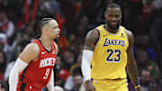 Jan 29, 2024; Houston, Texas, USA; Houston Rockets forward Dillon Brooks (9) reacts toward Los Angeles Lakers forward LeBron James (23) after scoring a basket during the fourth quarter at Toyota Center. Mandatory Credit: Troy Taormina-Imagn Images