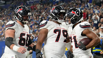 Houston Texans running back Nick Chubb (21) celebrates after rushing for a touchdown Sunday, Nov. 30, 2025, during a game against the Indianapolis Colts at Lucas Oil Stadium in Indianapolis.