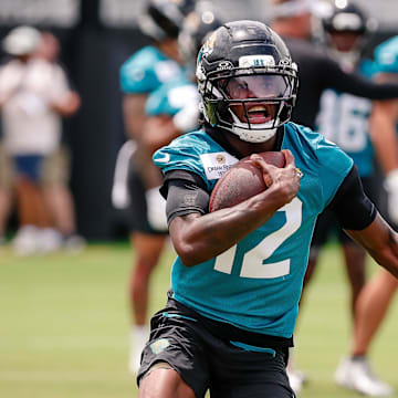 May 10, 2025; Jacksonville, FL, USA; Jacksonville Jaguars wide receiver Travis Hunter (12) runs after completing a passing drill during rookie minicamp at Miller Electric Center. Mandatory Credit: Travis Register-Imagn Images