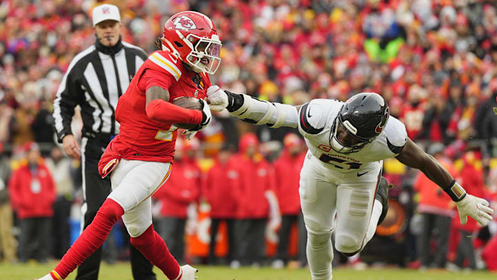 Jan 18, 2025; Kansas City, Missouri, USA; Houston Texans defensive end Will Anderson Jr. (51) drags down Kansas City Chiefs wide receiver Xavier Worthy (1) during the first quarter of a 2025 AFC divisional round game at GEHA Field at Arrowhead Stadium. Mandatory Credit: Jay Biggerstaff-Imagn Images